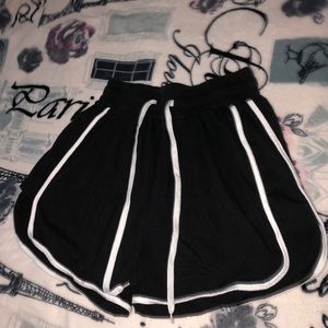 Black sand white shorts